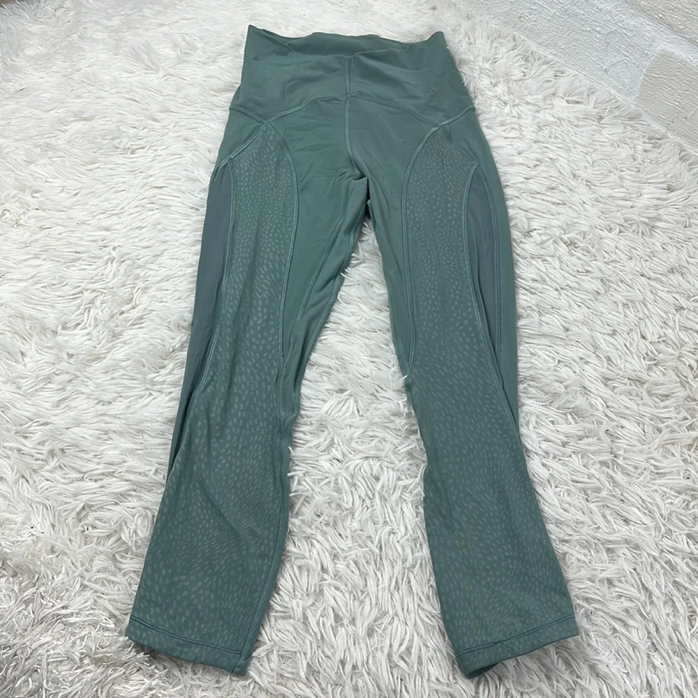 Lululemon Nulu and Mesh Mid-Rise Yoga Crop 23